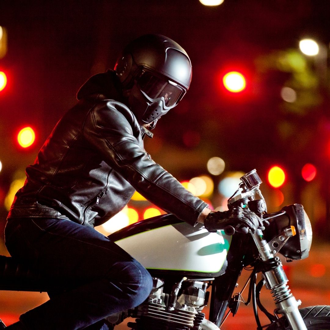 motorcycle rider at night