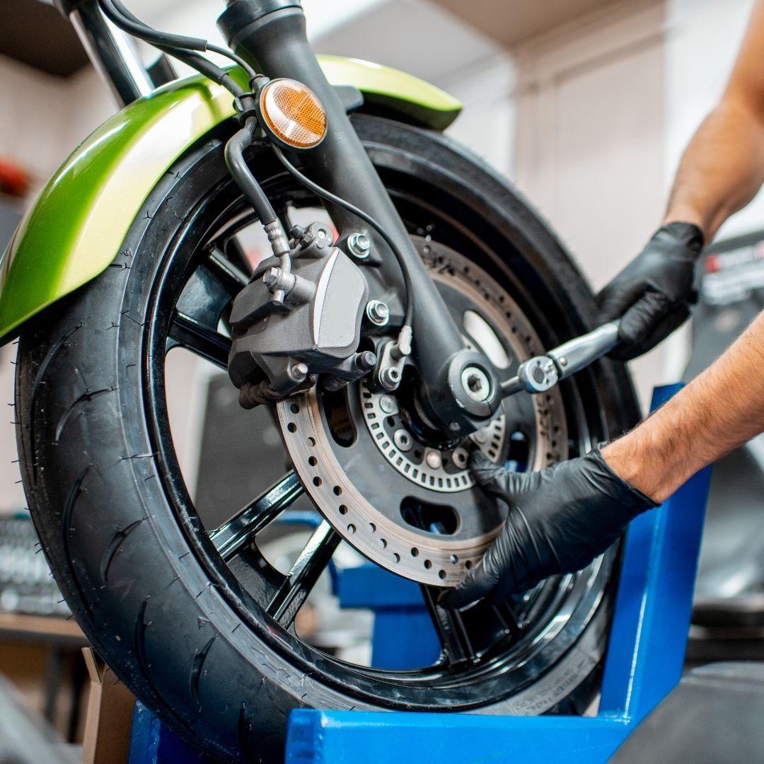 motorcycle undergoing maintenance