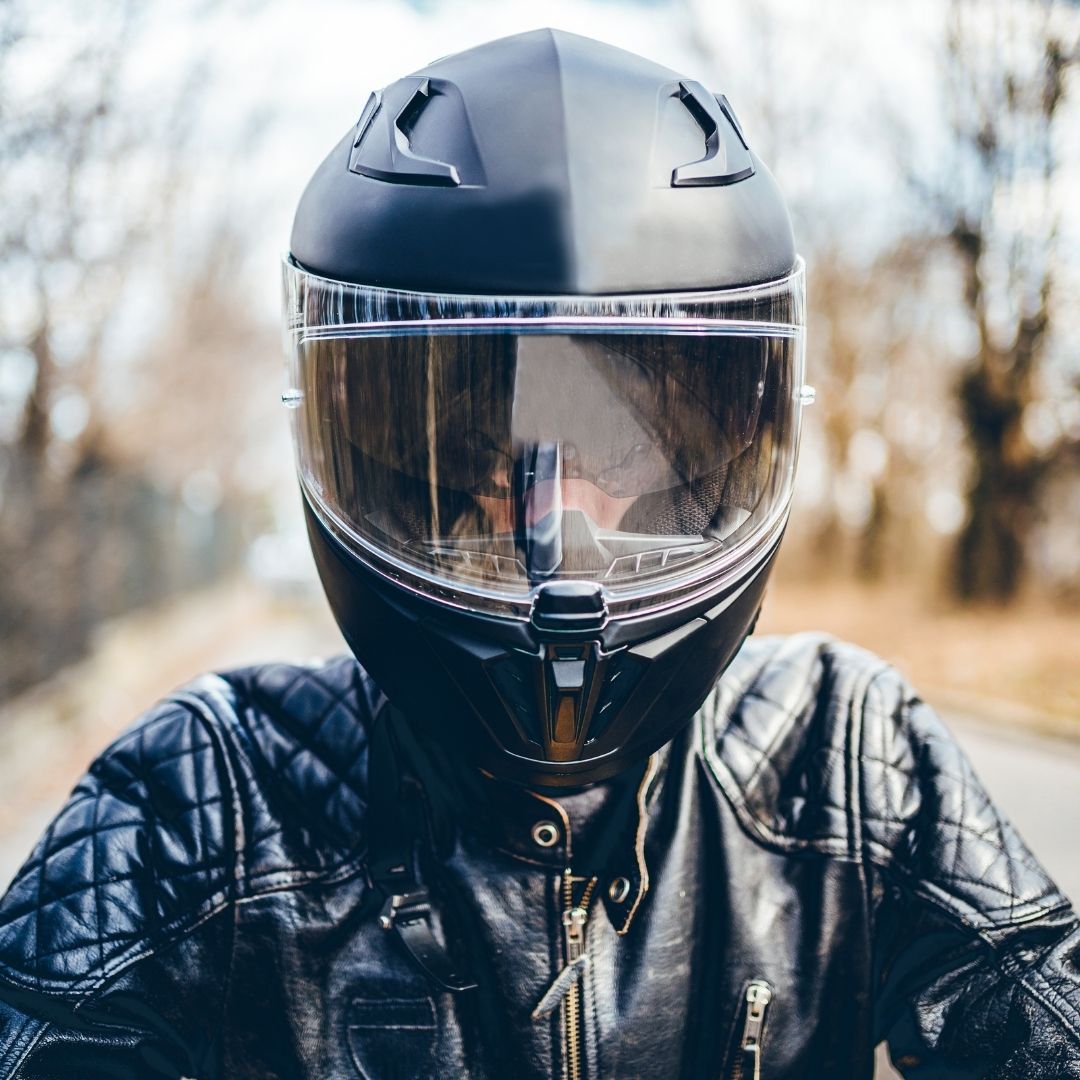motorcycle rider with helmet