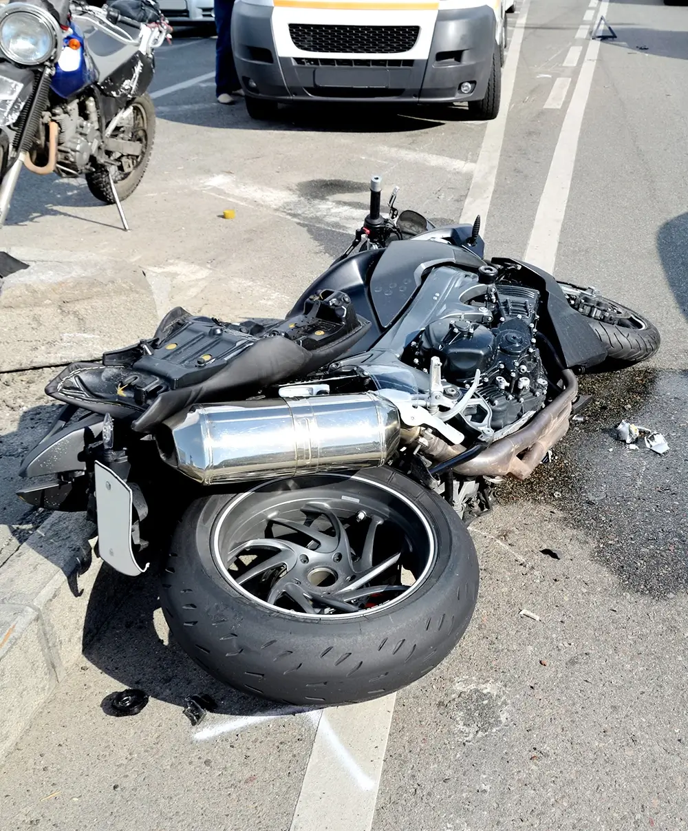 Motorcycle accident on pavement